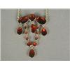 Image 1 : A Victorian garnet necklace, the round, oval and pear shape stones with closed back settings in g...