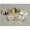 Image 1 : Five various rings including two set with diamonds Est. 150/200...