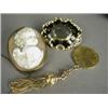 Image 1 : Three items: A mourning brooch, cameo brooch and a mounted guinea with tassel Est. 80/120...