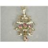 Image 1 : An antique 9ct gold pendant set with pink tourmaline and seed pearls, 4cm long, on a chain Est. 1...