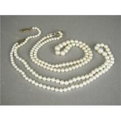 Two single row pearl necklaces, 41 and 48cm long, both with 9ct clasps, one set with diamonds Est...