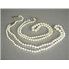 Image 1 : Two single row pearl necklaces, 41 and 48cm long, both with 9ct clasps, one set with diamonds Est...
