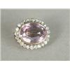 Image 1 : A Victorian amethyst and diamond cluster brooch, the bazel set amethyst surrounded by 25 eight-cu...