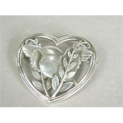 A Georg Jensen silver brooch to a design by Amo Malinowski, stamped 239, 4cm wide Est. 100/150...