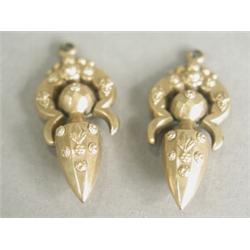 A pair of 19th century yellow metal (test gold) pendant earrings, (without fittings), 4cm long Es...