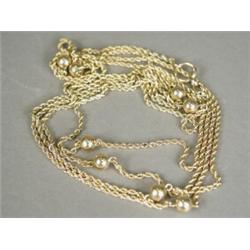 A 9ct gold ropetwist longuard chain with intermittent ball links, 140cm long Est. 175/275...