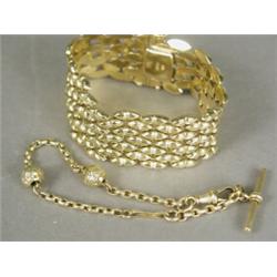 Two bracelets: an 18ct gold fancy gatelink, 18cm long, and a yellow metal belcher link Albert cha...