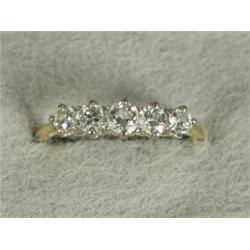 A five stone diamond ring set in 18ct gold (shank needs repair), size P Est. 350/400...