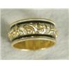 Image 1 : A George V 18ct gold mourning ring with a central engraved and embossed foliate band within black...