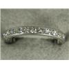 Image 1 : A diamond eternity ring, channel set with brilliant cut stones in engraved white metal (test plat...