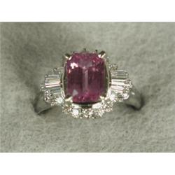 A pink sapphire and diamond dress ring set in platinum, size M Est. 1100/1300...