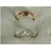 Image 1 : Two rings: a five stone ruby and diamond half hoop, and a diamond solitaire, sizes I 1/2 and P Es...