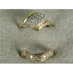 A pair of interlocking diamond rings, set in 18ct gold, size H Est. 250/300...