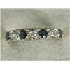 Image 1 : A sapphire and diamond seven stone ring, set in 18ct gold, size O Est. 120/160...