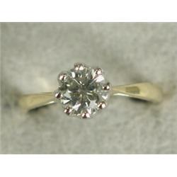 A diamond solitaire ring (approx 1.12ct), set in 18ct white gold to a yellow shank, size O Est. 1...