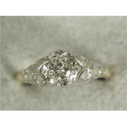 A diamond solitaire ring set in 18ct gold and platinum, size K 1/2 Est. 120/150...