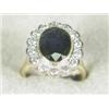 Image 1 : A sapphire and diamond cluster ring (sapphire approx 5cts, total diamond weight approx 1.4cts), s...