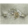 Image 1 : An 18ct white gold two-stone twist diamond ring, one stone cushion cut, tinted, the other round b...