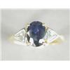 Image 1 : A sapphire and diamond 3-stone ring, the central oval sapphire of approx 1.75cts flanked by two t...