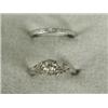 Image 1 : A platinum mounted diamond solitaire ring within pierced and engraved shoulders and engraved shan...