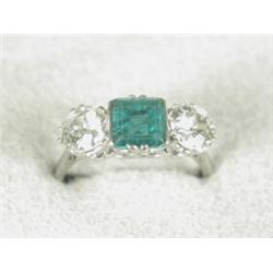 A three stone emerald and old cut diamond ring set in platinum (emerald approx 1ct, diamond appro...