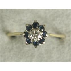 A sapphire and diamond cluster ring, size Q Est. 100/150...