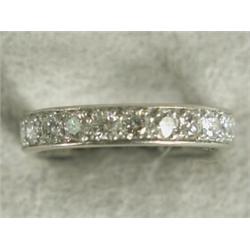 A diamond eternity ring set in white metal (tests platinum), size P Est. 500/600...