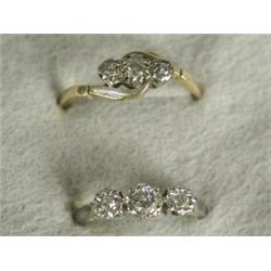 Two 3-stone diamond rings set in 18ct gold, sizes N 1/2 and O Est. 80/120...