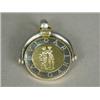 Image 1 : A Bulgari swivel fob pendant, 2.5cm in diameter Est. 200/300...
