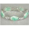 Image 1 : A diamond and carved jade bracelet set with approx 1ct of diamonds, in 18ct white gold and platin...