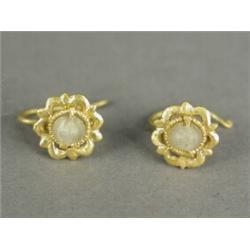 A pair of antique yellow metal and pearl earrings, and a 22ct gold knot brooch, 2.5cm long Est. 7...