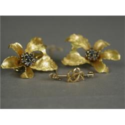 A pair of yellow metal clip earrings set with sapphires, 3.5cm long Est. 50/80...