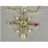 Image 1 : A seed pearl and gem set pendant, 3.5cm long on a 15ct gold rope and twist fetter chain Est. 80/1...