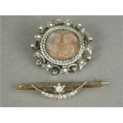 Two brooches: one diamond set, 4.5cm long, the other inset with seed pearls, 3cm diameter Est. 15...