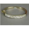 Image 1 : A late Victorian hinged bangled set with forty old cut diamonds in yellow metal (tests 18ct gold)...