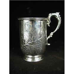 A Victorian silver christening mug engraved with holly leaves, 1872 Est. 75/125...