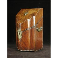 A George III strung mahogany cutlery box, the fitted interior with twelve two pronged forks and t...