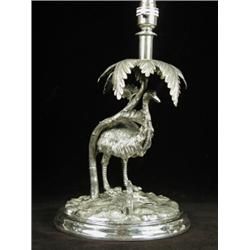 A late 19th century silver plated emu table lamp on a circular base by James Deakin & Son (later...
