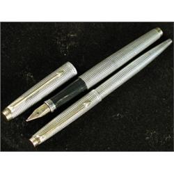 A sterling silver Parker pen set, with cross hatched decoration (fountain pen and a biro) Est. 20...