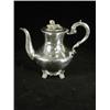 Image 1 : A William IV silver coffee pot and cover with a melon knob, scrolled handle and cast feet 1833, a...