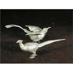 A white metal model pheasant, 15cm long Est. 180/220...