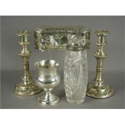 A George IV silver epaulette box with repousse decoration and a hinged lid 1830,approx 16oz, 22cm...