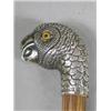 Image 1 : An Edwardian silver mounted parasol, the silver handle in the form of a parrot on a bamboo shaft,...