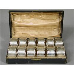 Twelve silver napkin rings in a fitted presentation box, 1921 Est. 100/150...