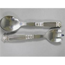 A pair of early 20th century Georg Jensen silver handled acanthus pattern salad servers, import m...