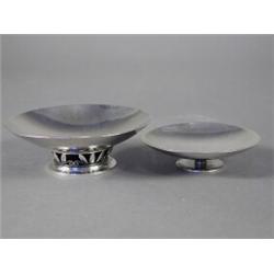 Two early 20th century Georg Jensen silver dishes, the smaller designed by Sigvard Bernadotte, de...