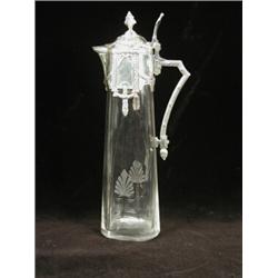 A WMF claret jug, with a classical swag mount, and etched glass body, 37cm high Est. 300/400...