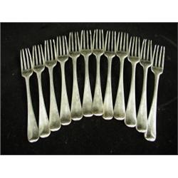 Twelve 18th century Old English pattern silver dinner forks (marks rubbed) Est. 150/200...