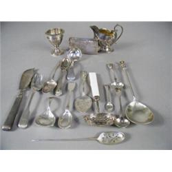 An early 18th century Mote spoon, a George IV silver butter knife, an 1892 silver Apostle spoon,...