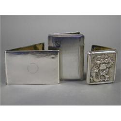 A Chinese embossed silver metal cigarette case, a Chinese silver metal cigarette case with makers...